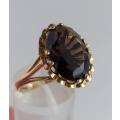 9 carat gold ring set with large rich brown topaz (1970s)