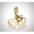 Yellow gold snake ring set with pavé diamonds