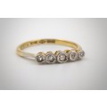 18ct gold and platinum ring set with 5 white diamonds