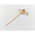 Edwardian 9ct gold jockey cap and whip stick pin