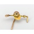 Edwardian 9ct gold jockey cap and whip stick pin