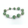 Genuine green jade and sterling silver bracelet