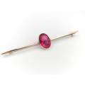 Edwardian rose gold and red stone bar brooch