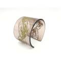 South African designer Phillippa Green engraved perspex cuff