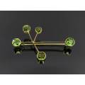 Southern Cross 14ct gold and green tourmaline brooch