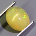 0.83Ct. Opal Oval Cabochon Yellow Multi Colours Gem Ravishing Ethiopian Natural
