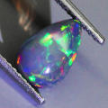 0.63Ct. Opal Pear Cabochon Multi Colours Glittering Rainbow 3D! Ethiopian Natural
