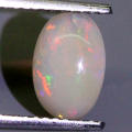 0.85Ct. Opal Oval Cabochon Multi Colours Glittering Rainbow 3D! Ethiopian Natural