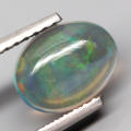 0.73Ct. Opal Oval Cabochon Multi Colours Glittering Rainbow 3D! Ethiopian Natural