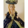 Must see musical figurine. Wind up with a crown and s stamp