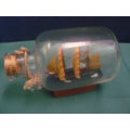 SHIP IN GLASS BOTTLE CORKED AND WOODEN STAND