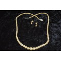 Vintage faux pearl necklace with earrings