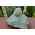 jade stone laughing buddha on wood base
