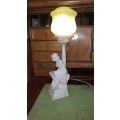 Art deco Italian alabaster lamp of lady sitting at a street lamp. REDUCED