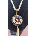 Lovely hand painted enamel tasseled pendant with cotton necklace