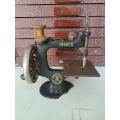 Vintage miniature singer sewing machine working