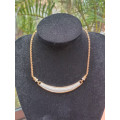 STUNNING Swarovski  gold platted evening ware necklace in original box. pleas have a closer look!!!!