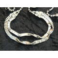 TWISTED DOUBLE STRAND SILVERTONED NCKLACE...WITH BLING 49 CM LONG VERY INTERESTING !!!!!