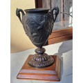 Antique spelter urn/vase with crane and hawk detail 35cm tall  REDUCED