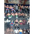 COLLECTORS LOT OF 62 WWF/WWE WRESTLING FIGURES