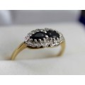 DAINTY ELLIPTICAL SAPPHIRE AND DIAMOND RING. 9ct YELLOW AND WHITE GOLD. VINTAGE ENGLISH
