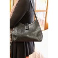 FOSSIL BRAND - BLACK LEATHER HANDBAG. COMES IN MATERIAL DUSTCOVER
