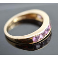 BEAUTIFUL REAL PINK SAPPHIRE CHANNEL SET 9CT YELLOW GOLD RING. 375