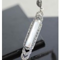 LONG ART DECO MOTHER OF PEARL AND MARCASITE STERLING SILVER PENDANT ON A SIMPLE 39CM CHAIN. 925