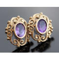 VINTAGE 9CT YELLOW GOLD FILIGREE STUD EARRINGS WITH OVAL FACETED AMETHYSTS. 375