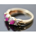 VINTAGE 9CT HALF ETERNITY YELLOW AND WHITE GOLD RUBY AND DIAMOND RING. 375