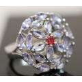 NATURAL TANZANITE FLORAL OPEN WORK PATTERN STERLING SILVER RING WITH CHERRY RED SAPPHIRE ACCENT. 925