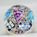 EYE-CATCHING LARGE DOMED REAL MOTHER OF PEARL STERLING SILVER RING. GORGEOUS COLOURS