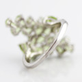 BEAUTIFUL CROSSOVER PERIDOT AND STERLING SILVER RING. DOUBLE STRAND DESIGN. 925