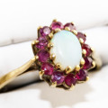 VINTAGE ENGLISH RUBY AND IRIDESCENT FIRE OPAL 9CT YELLOW GOLD RING COMES WITH JEWELLER CERT R11`500
