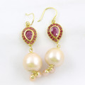 GLAMOROUS RUBY AND BAROQUE PEARL YELLOW GOLD-HUED STERLING SILVER DROP AND DANGLE EARRINGS. 925