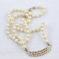 CLASSY SINGLE STRAND NATURAL PEARL NECKLACE WITH SOLID STERLING SILVER TWISTED STRAND PENDANT