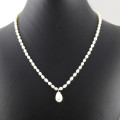 ELEGANT AND CLASSIC NATURAL BAROQUE PEARL PENDANT ON A 44CM HANDSTRUNG PEARL NECKLACE. 925