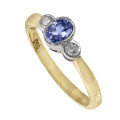 CONTEMPORARY DESIGN TANZANITE AND DIAMOND 9CT YELLOW and WHITE GOLD RING VALUATION CERT R18`000