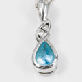 BLUE TOPAZ AND DIAMOND 9CT WHITE GOLD PENDANT ON 40cm 9CT CURB CHAIN *JEWELLER EVALUATION R 10`000 *