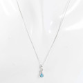 BLUE TOPAZ AND DIAMOND 9CT WHITE GOLD PENDANT ON 40cm 9CT CURB CHAIN *JEWELLER EVALUATION R 10`000 *