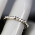 9ct  WHITE GOLD CHANNEL SET CUBIC ZIRCONIA ETERNITY RING. LONDON, ENGLAND HALLMARKED