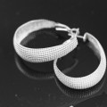 A DIFFERENT TAKE ON CLASSIC STERLING SILVER HOOP EARRINGS! 925