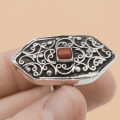 UNUSUAL STERLING SILVER CORAL GEMSTONE RING WITH TACTILE DECORATIVE DETAIL