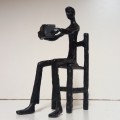 IRON SCULPTURE  - ART - MAN SITTING AND READING