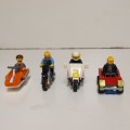 Four Lego Minifigurines And Lego Vehicles