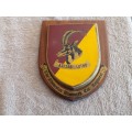The Rhodesian Armoured Car Regiment wooden plaque emblem.