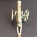 Small beautifully made brass plated cannon with wheels and rammer