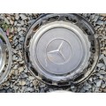 Vintage -Mercedes Hub-Caps and beauty rings