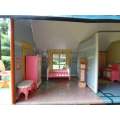 VINTAGE LARGE TINPLATE DOLL HOUSE MADE IN JAPAN, FURNITURE EXCLUDED. 630 X 200 X 400 MM HIGH