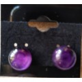 Sterling silver stud earrings with Amethysts. E56